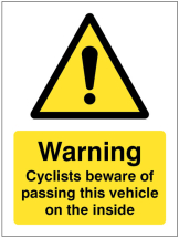 CYCLISTS BEWARE OF PASSING THIS VEHICLE ON THE INSIDE