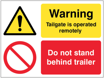 TAILGATE IS OPERATED REMOTELY DO NOT STAND BEHIND TRAILER